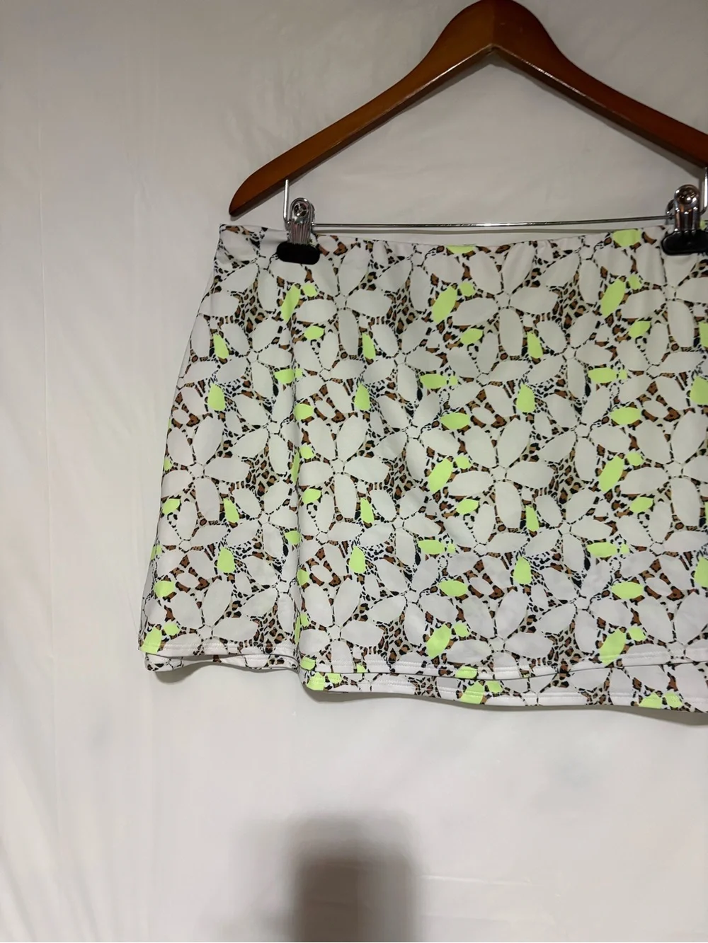 Cross court Floral Cutout Tennis Skort in White with Neon Yellow Accents